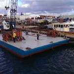 Final deck re-coat of spinefex barge
